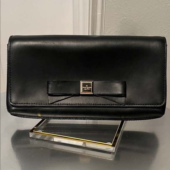 kate spade Handbags - Kate Spade Black Clutch with Bow Detail and Bright Pink Interior